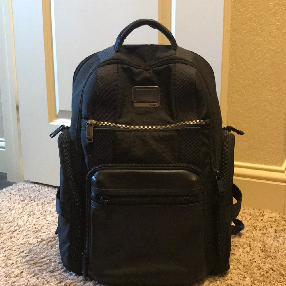 Alpha Bravo Tumi backpack with leather front pocket